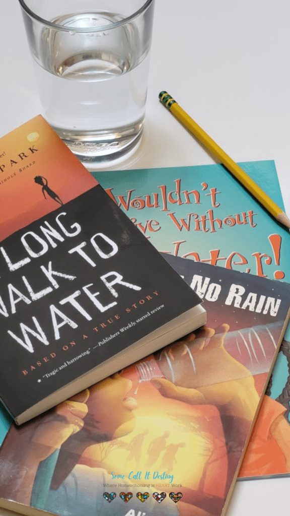 images of three books set in South Sudan and a glass of water and pencil