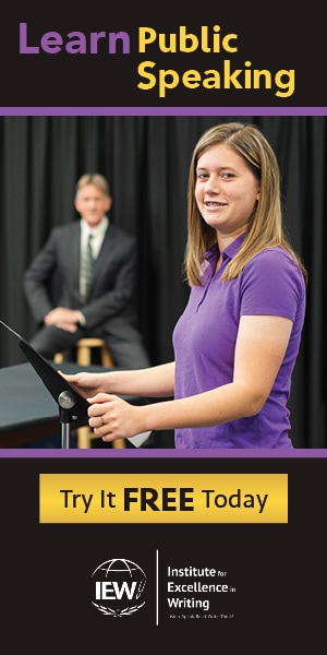 teen girl in purple shirt at stand with writing Learn Public Speaking Try it free today