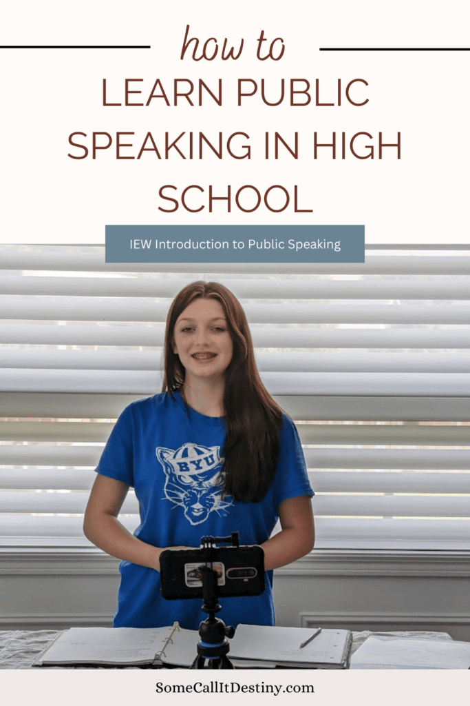 teen girl in blue shirt standing in front of cell phone on stand to record a speech. Title reads how to learn public speaking in high school IEW Introduction to Public Speaking